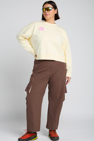 Woman wearing Detour Sweatshirt and Trailmix Pant for SENIQ Outdoor Technical Clothing