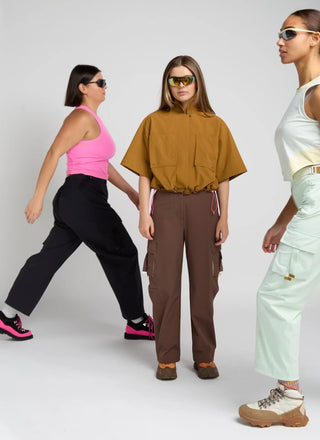 Women wearing SENIQ technical clothing made for movement