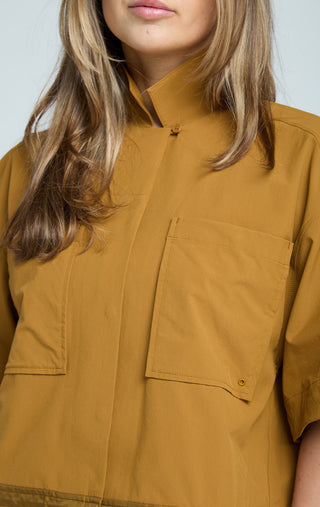 Woman wearing SENIQ Dirtpop Trek Jacket