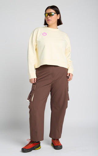 Woman wearing Detour Sweatshirt and Trailmix Pant for SENIQ Outdoor Technical Clothing